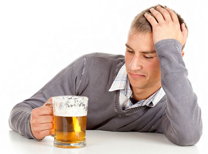 A man drinks beer as you stop